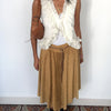 Jupe vintage asymétrique camel en matière peau de pêche – Taille 40