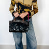 Sac à main en cuir vernis Francesco Biasa