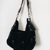 Sac à main demi-lune en cuir daim noir & cuir vernis