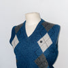 pull sans manches avec un col en V ( SOLD OUT )